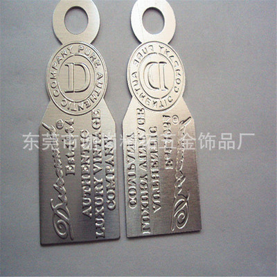 订制金属浮雕logo吊牌 精美品牌外贸吊牌的制造艺术与市场价值